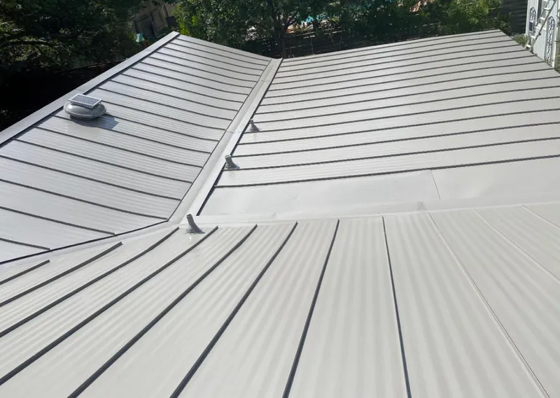 Solar attic fan installed on a metal roof for Roof Ventilation in Antioch